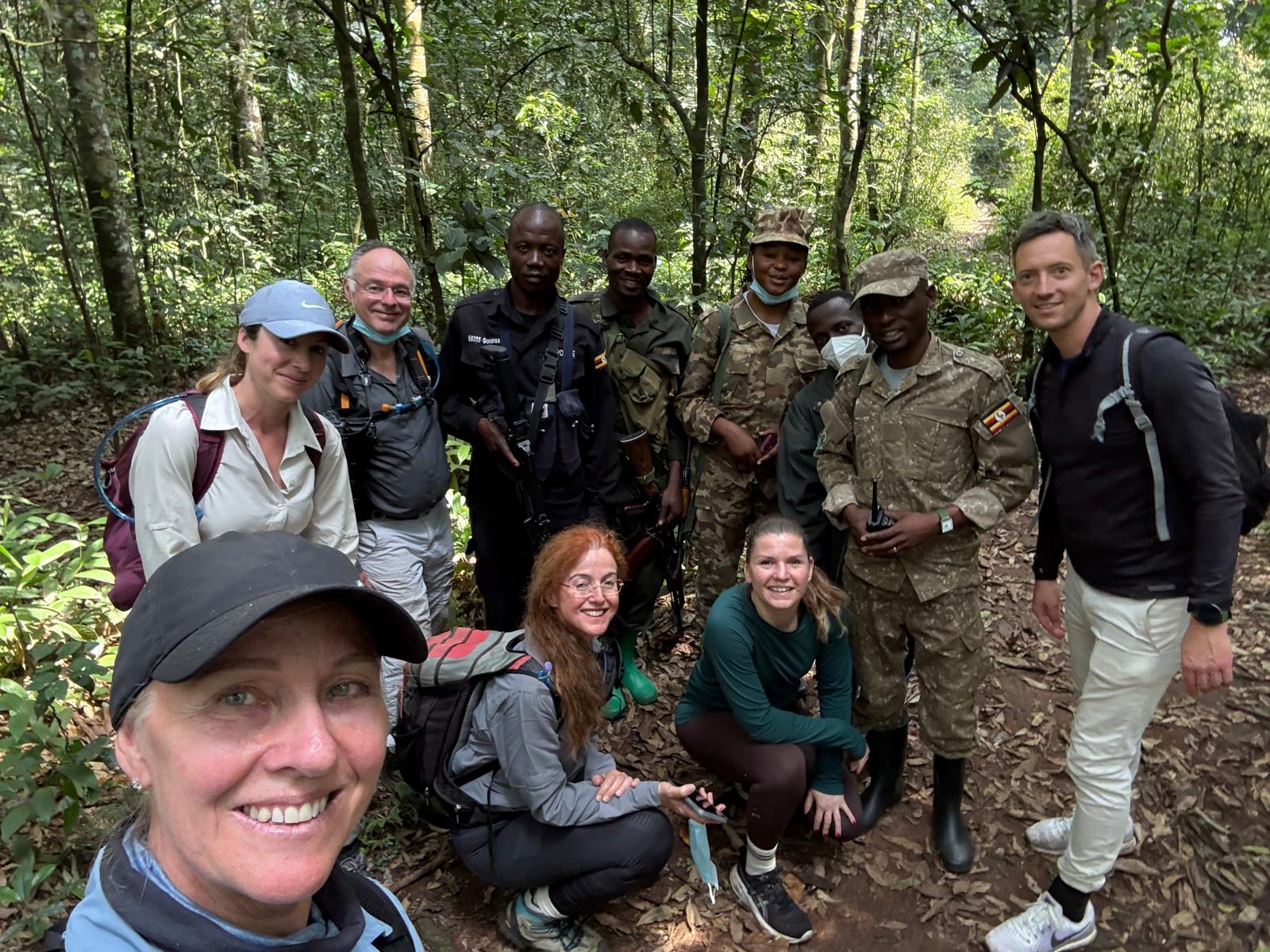 Primate trekking guide with tourists